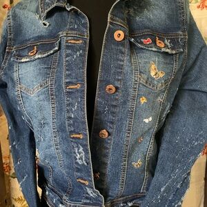 Distressed ladies denim jacket